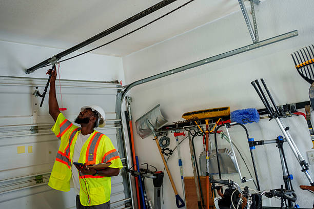 Professional Garage Door Panel Replacement technician working in Dickinson County County, IA